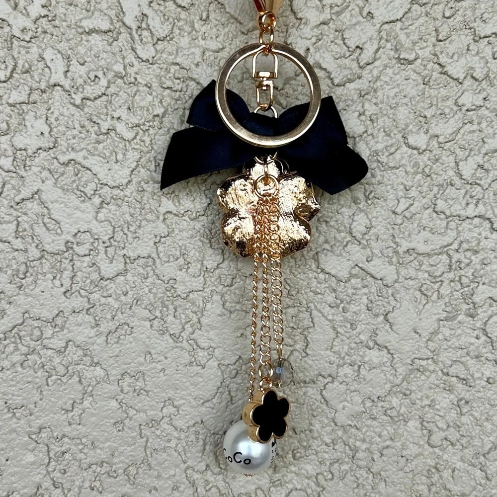 Luxe White Floral Keychain/Bag Charm with Black Bow